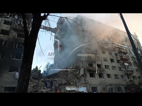 Scenes of devastation as residential buildings hit during deadly Russian attack on Ukraine capital