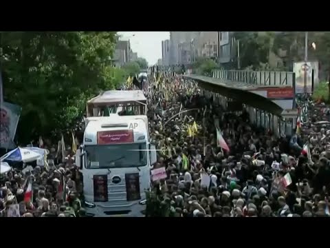 Coffins of Iranian generals and scientists killed in Israeli strikes arrive on trucks for funeral