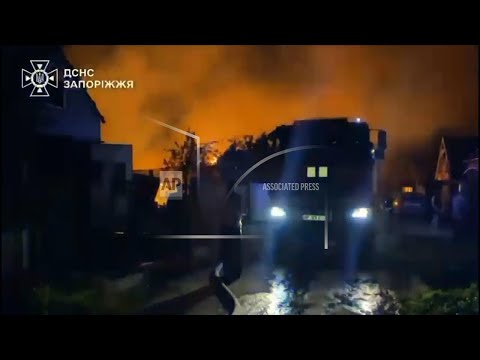 Firefighters battle flames in Zaporizhzhia as emergency service says Russian strikes hit area